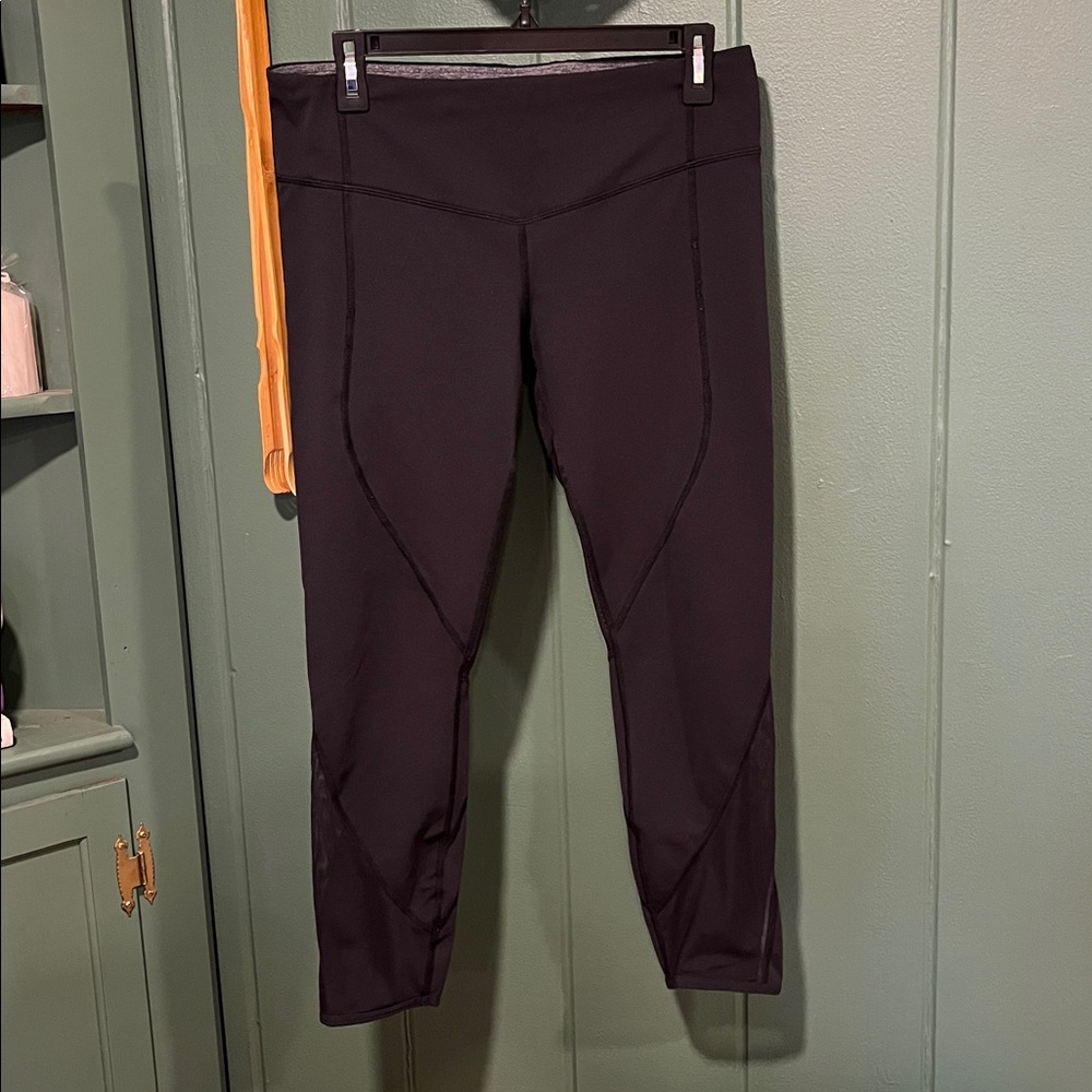 Lululemon black leggings with mesh accents